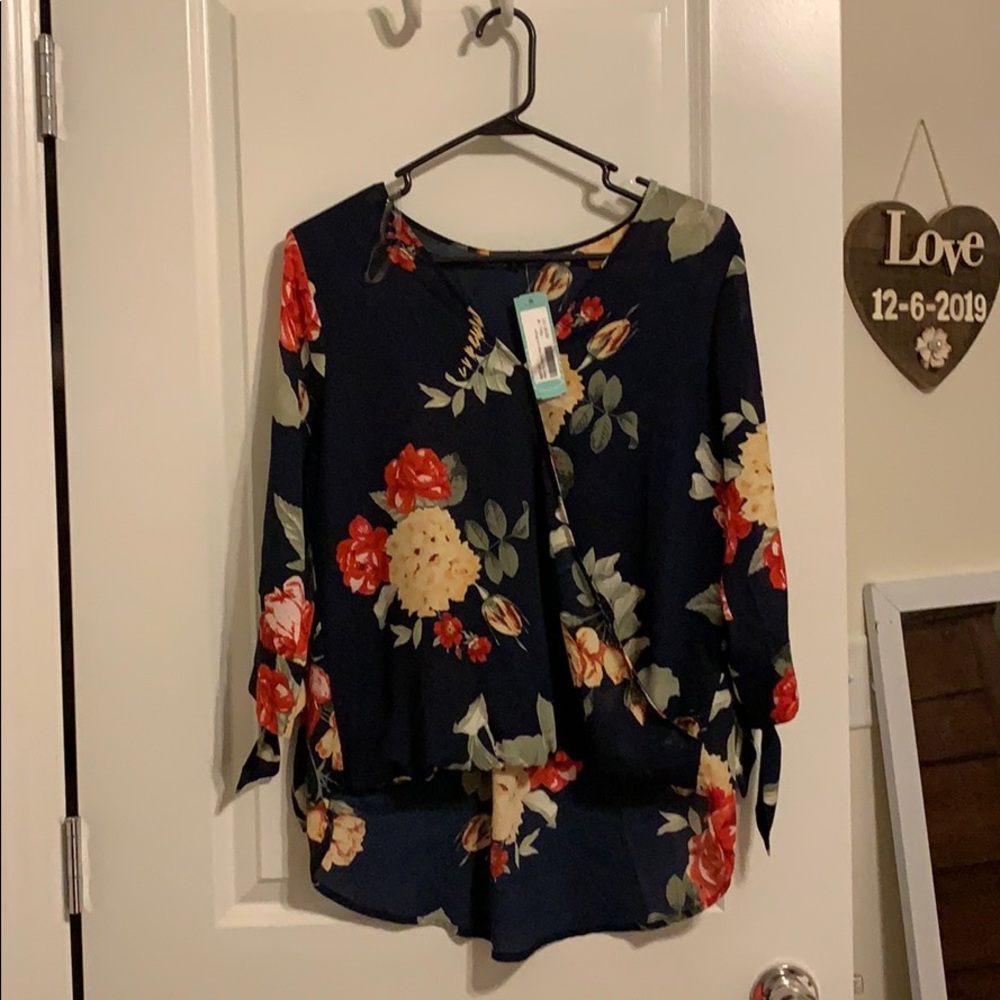 Navy blouse with floral design